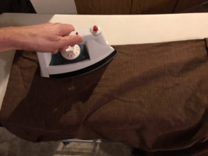 Travis ironing Jedi robe