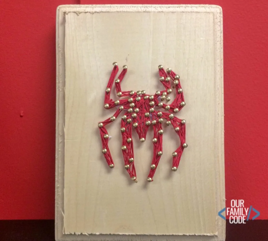 https://ourfamilycode.com/wp-content/uploads/2018/08/DIY-Spiderman-Wall-Art-Superhero-String-Art-e1534985301428.jpg.webp