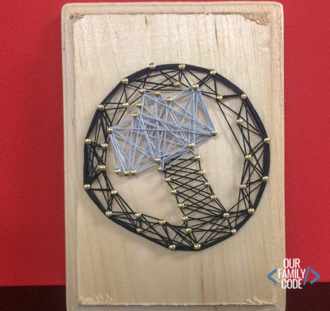 A picture of Thor superhero string art.