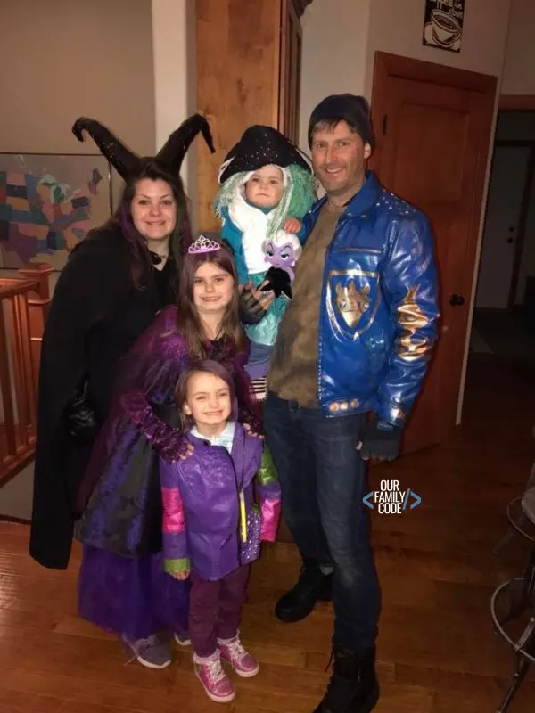 A picture of a family halloween costume from Disney Descendants.