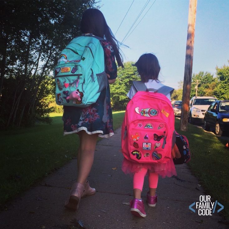 Girls Walking with their backpacks