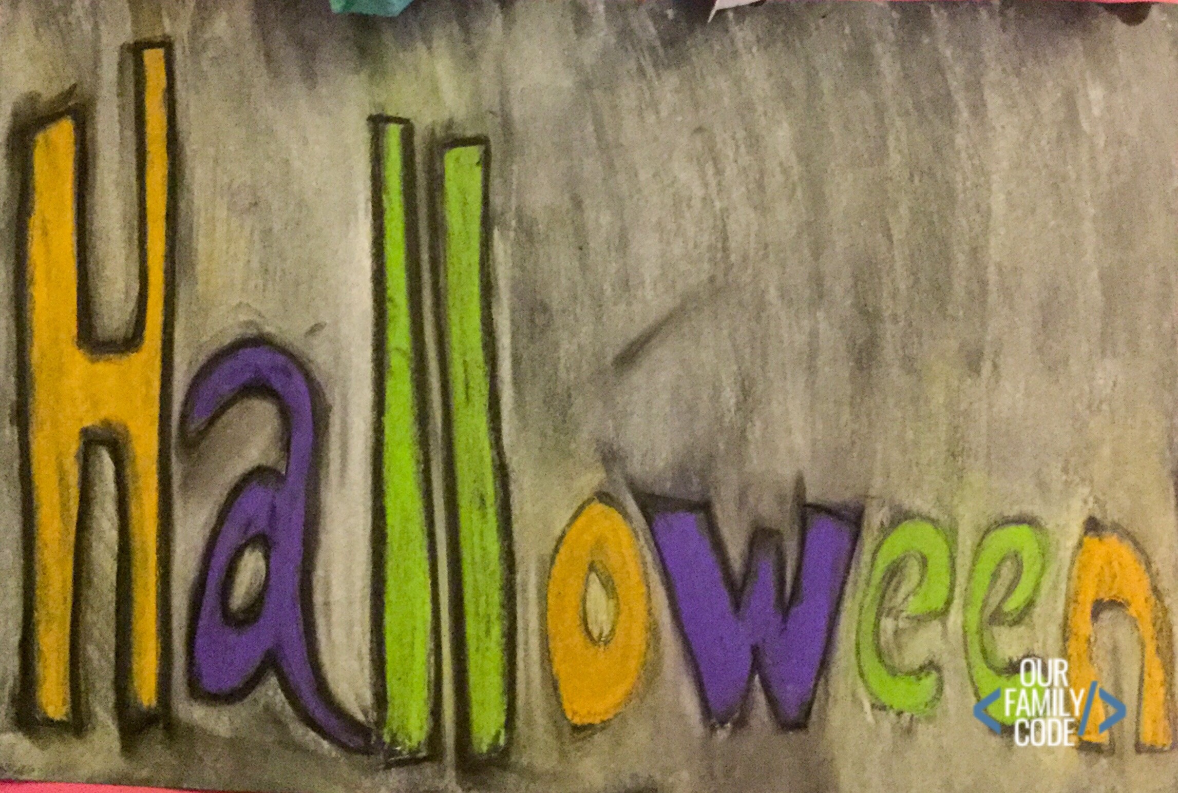 A picture of "Halloween" made with glue resist art.