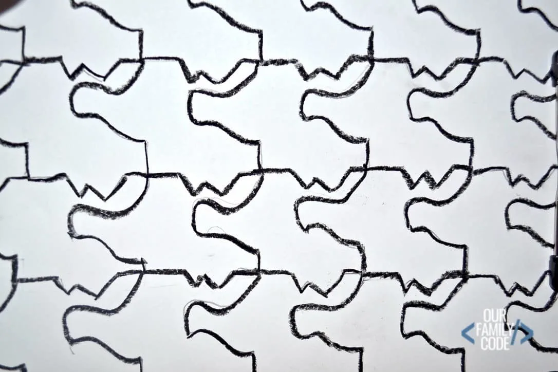 This oil resist tessellation art is a great way to combine science, art, and math into one masterful activity for kids! #STEAMactivities #STEM #scienceforkids #kidartprojects #engineeringforkids #STEAM