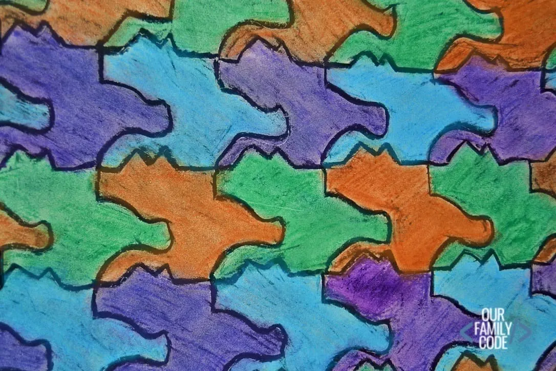 This oil resist tessellation art is a great way to combine science, art, and math into one masterful activity for kids! #STEAMactivities #STEM #scienceforkids #kidartprojects #engineeringforkids #STEAM