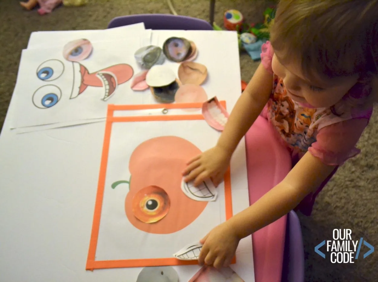 toddler pumpkin decorating faces