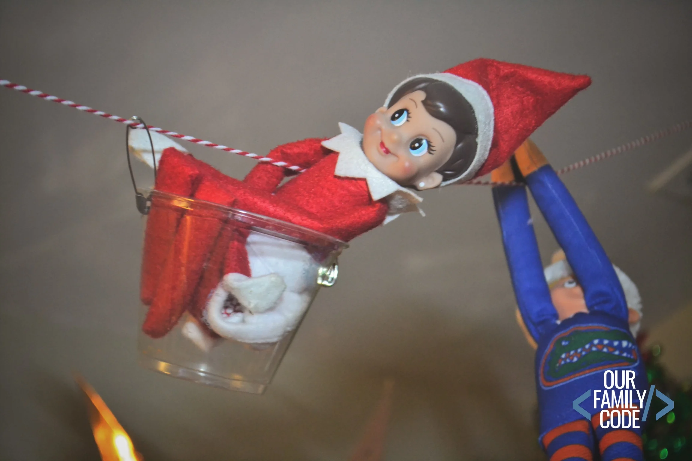 This Elf engineer zip line STEAM challenge for Elf on the Shelf is a fun way to add science to the season and learn about potential and kinetic energy! #elfontheshelf #STEAM #ChristmasSTEM #STEM