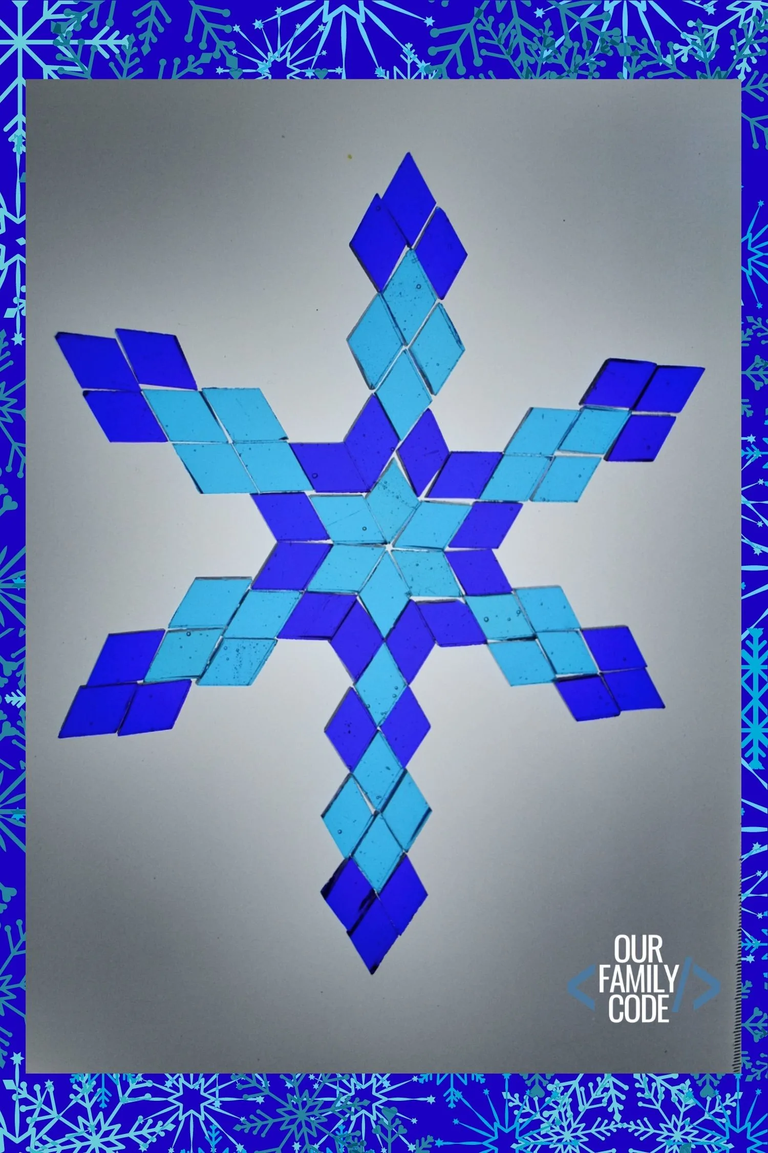 Mosaic pieces are a great way to create an invitation to play for older kids! Find out what you need to make mosaic snowflakes at Our Family Code! #winteractivitiesforkids #kidscrafts #mosaicartwork #tangrams #mathart #STEAM #STEM