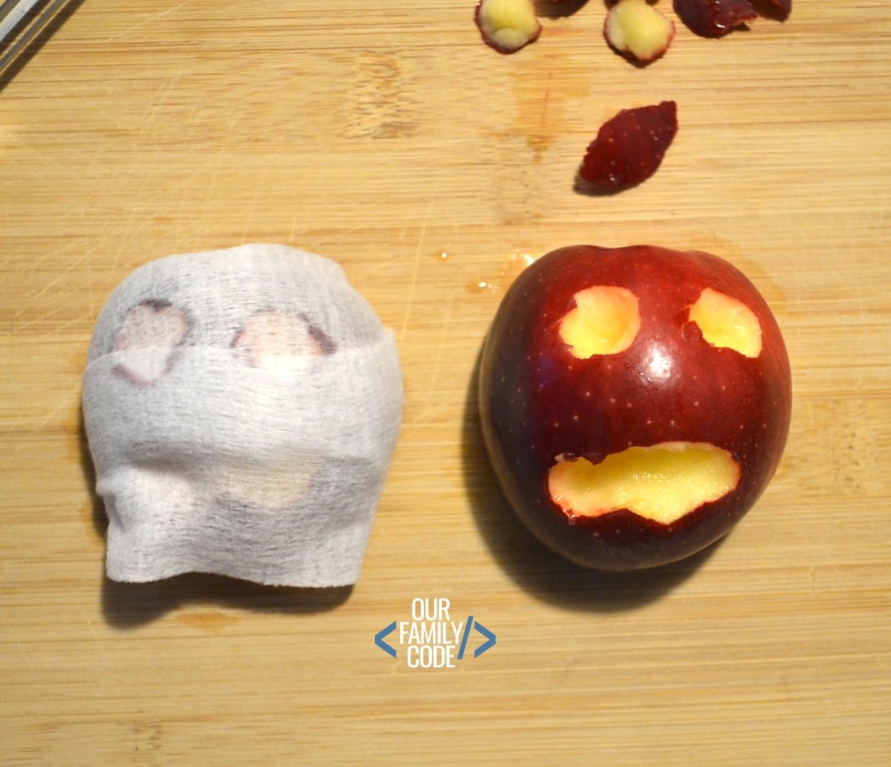 A picture of an apple mummy and a carved apple face.