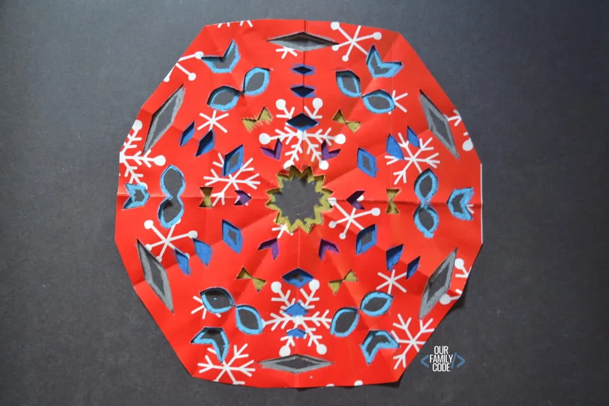 math art frozen snowflake symmetry stencil wax resist art