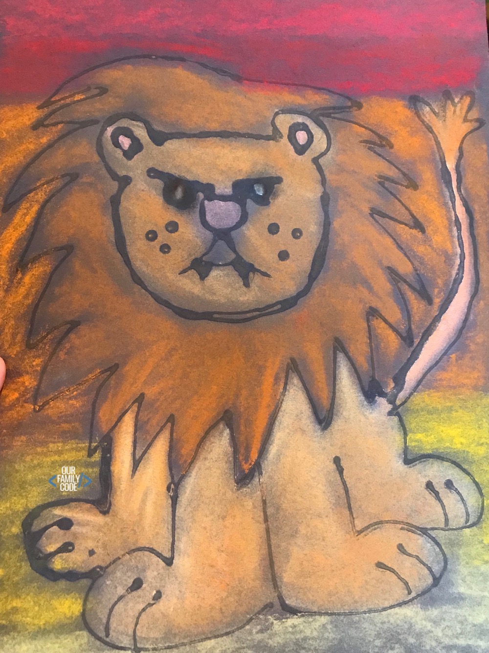 A picture of a lion chalk pastel glue resist art project.