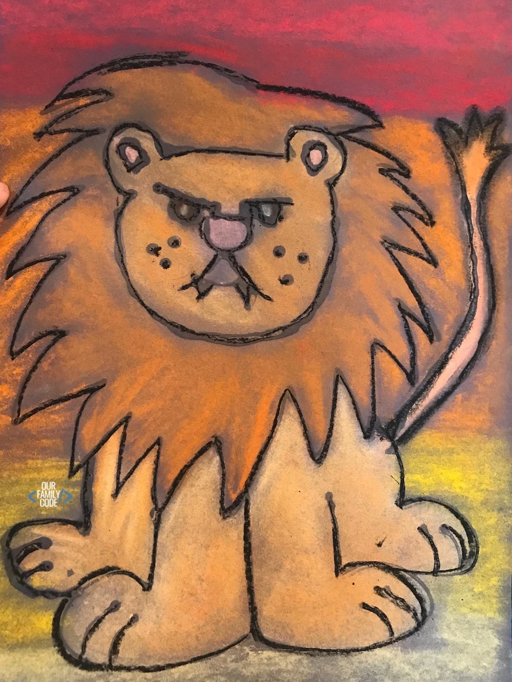 A picture of a lion chalk pastel glue resist art project.