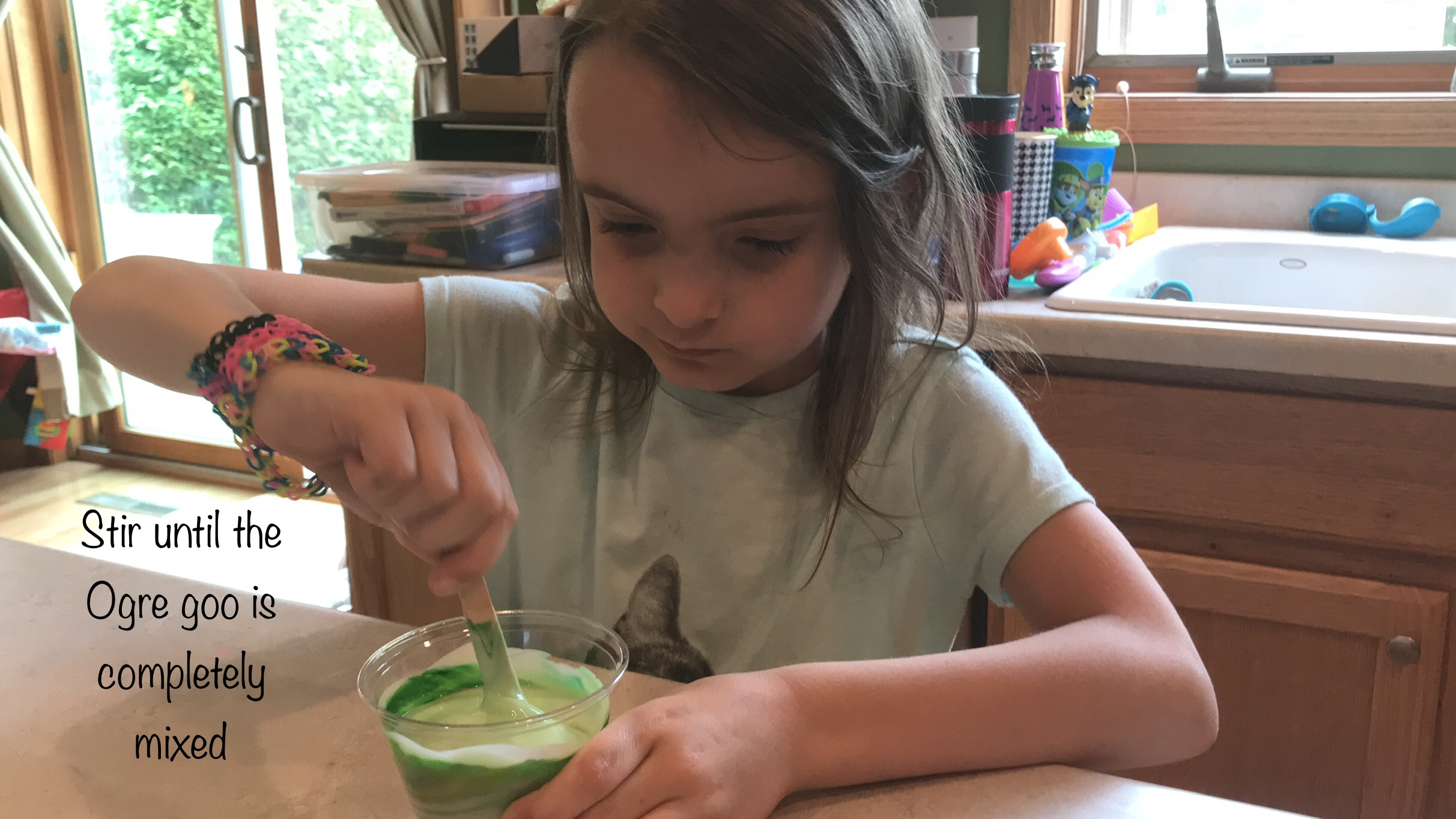 ogre slime stir ogre goo Learn about molecules, polymers, and chemical reactions with this oozing ogre slime Halloween sensory activity!