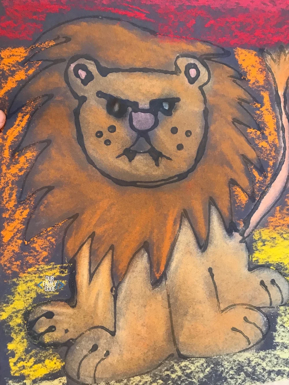 A picture of a chalk pastel glue resist art lion picture.