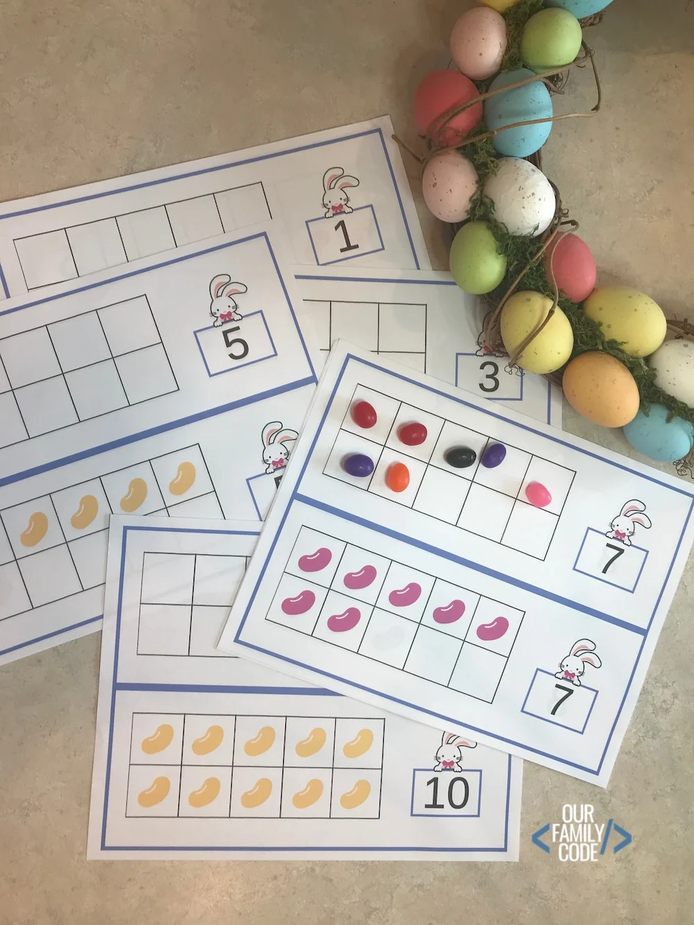 A picture of easter ten frames with a bunny and jelly beans.