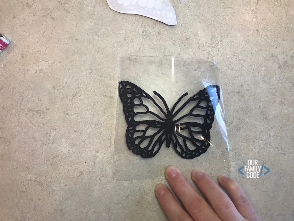 A picture of a butterfly traced on plastic.