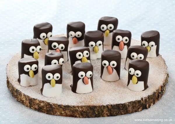 Cute and easy marshmallow penguins recipe fun penguin themed food idea for kids from Eats Amazing UK This is your one-stop shop for easy Christmas crafts, activities, and Christmas cookie recipes for kids! You are going to love this ultimate Christmas list!