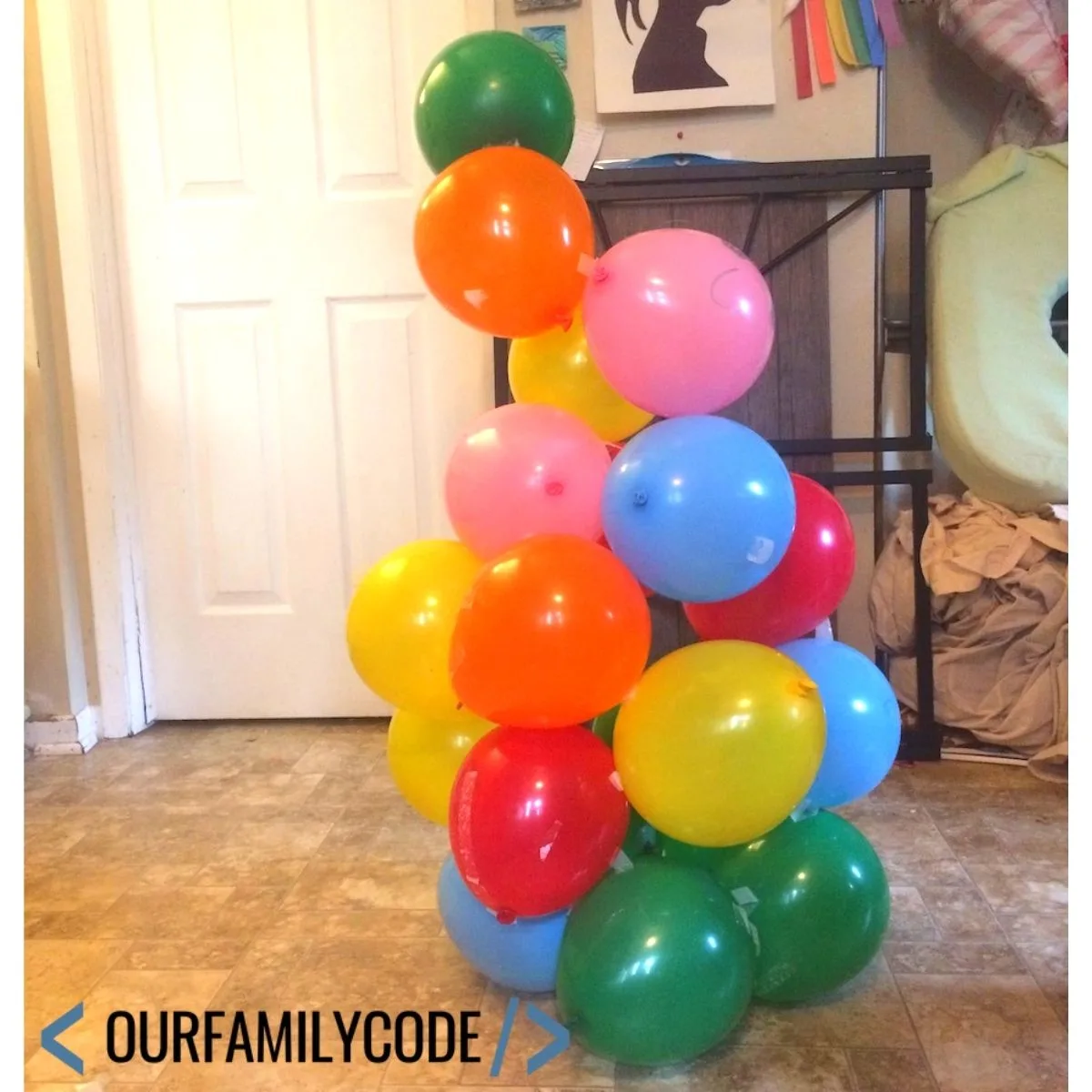 A picture of a balloon tower made with tape and balloons.