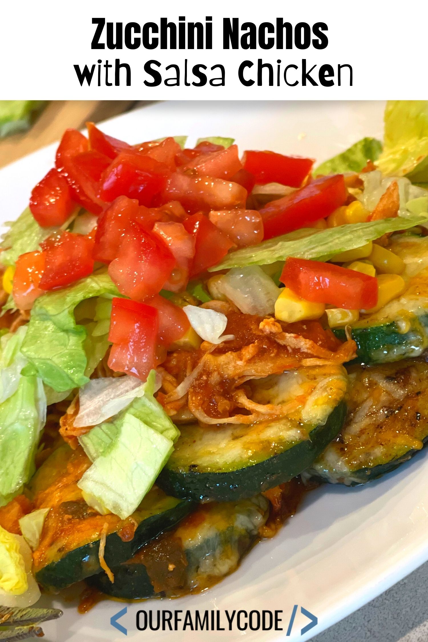 A picture of zucchini nachos with shredded chicken on top.