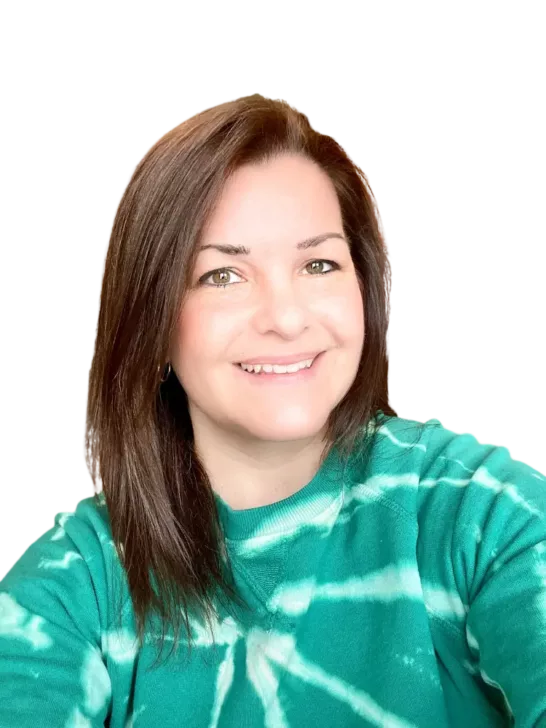 A picture of Toni, the author, wearing a green tie dyed shirt.